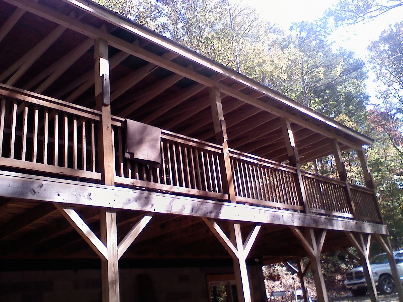 Timber framing under a new elevated porch and deck — Roof Leak Repair in Zeeland by Roofing Brothers